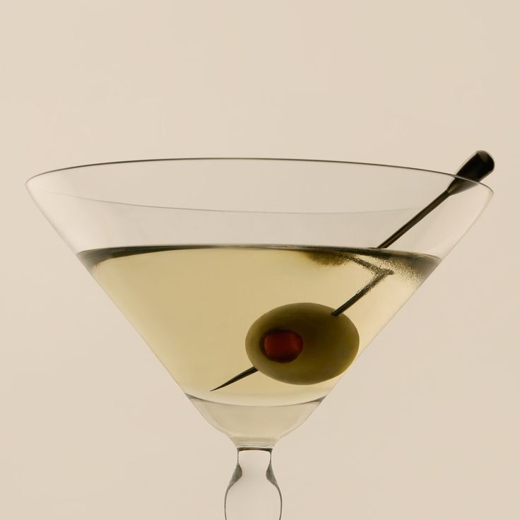 Classic martini with a green olive